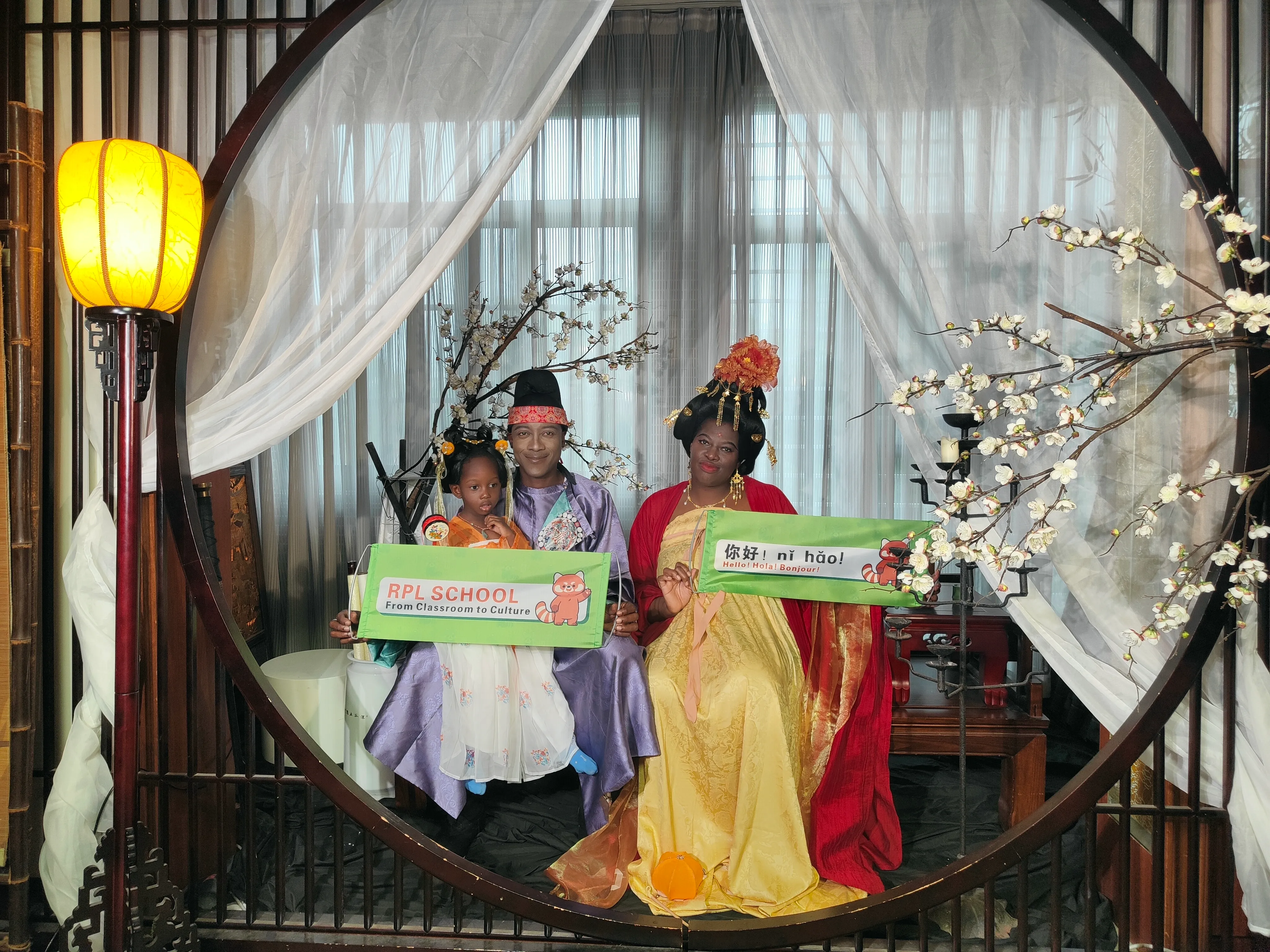 A student trying on hanfu during a cultural afternoon