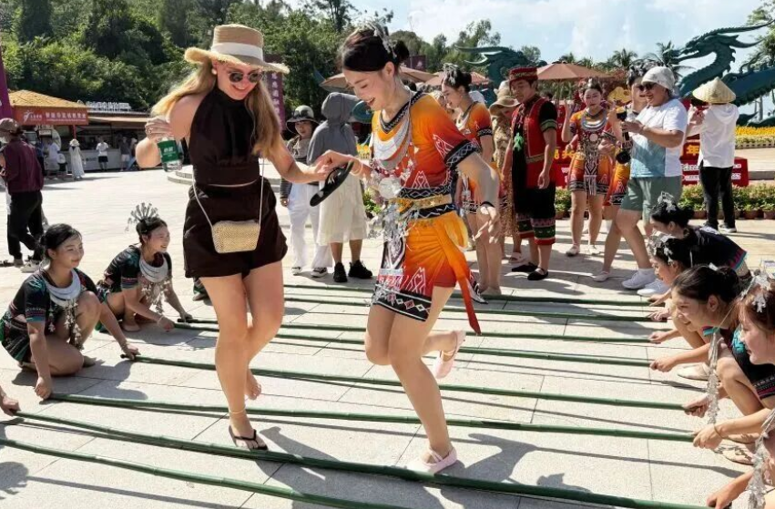 Students dancing the bamboo pole dance